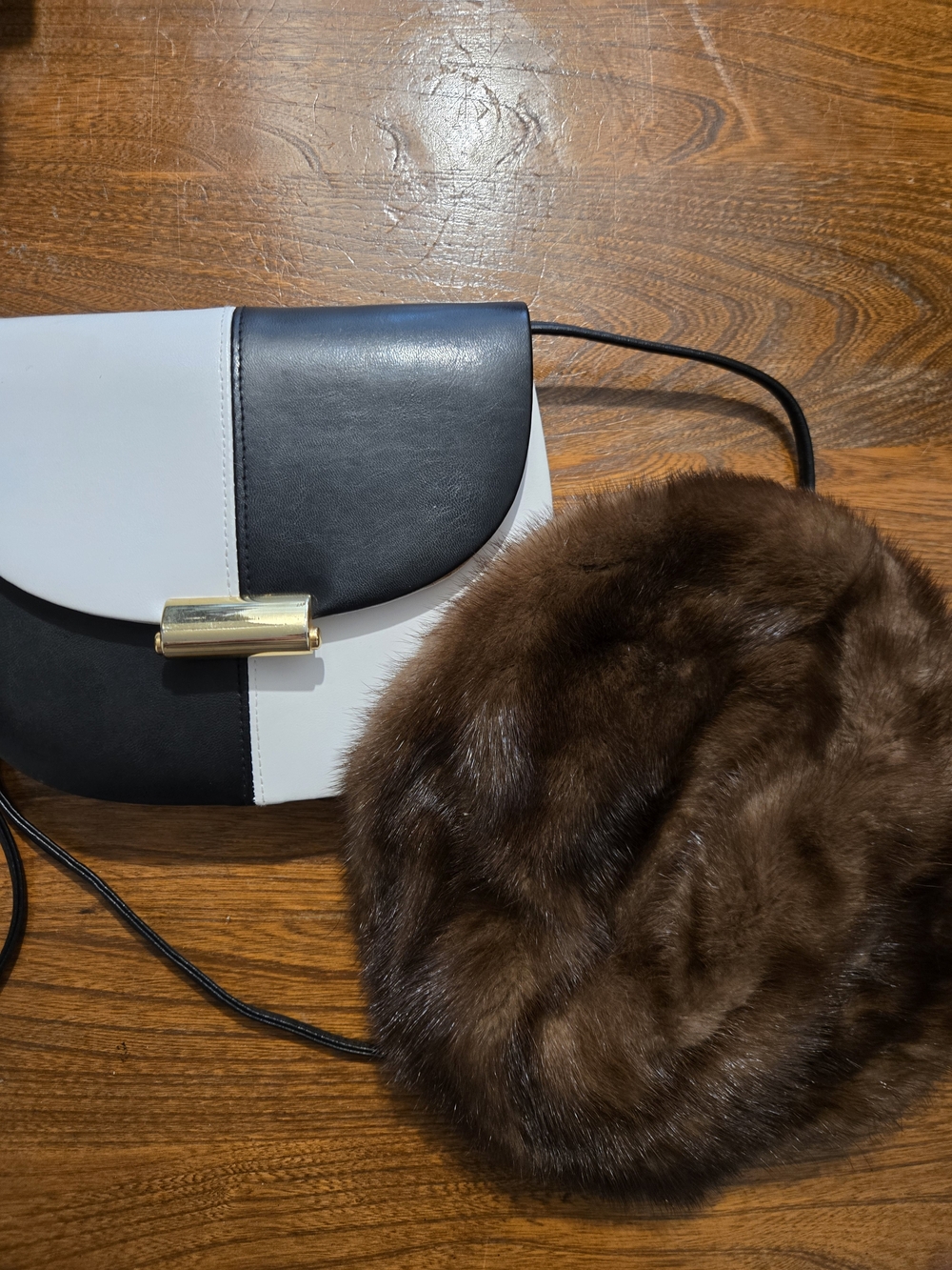 Two-Tone Black & White Crossbody Bag with Gold Accent